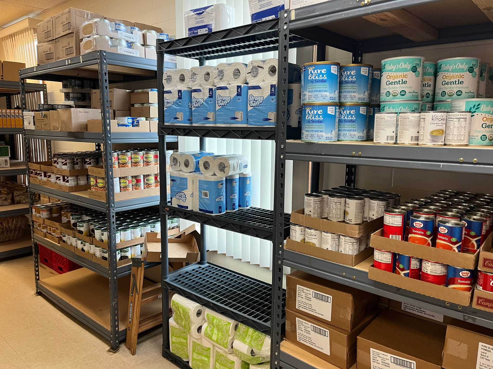 Stocked food pantry shelves